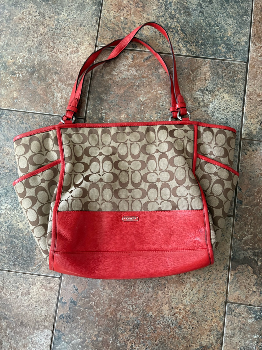 Coach Park Signature Carrie tote brown beige monogram red leather strap bottom